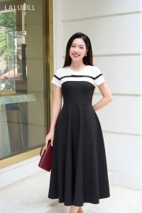 ĐẦM LIỀN DÁNG A XOÈ NƠ NGỰC MÀU ĐEN PHỐI TRẮNG